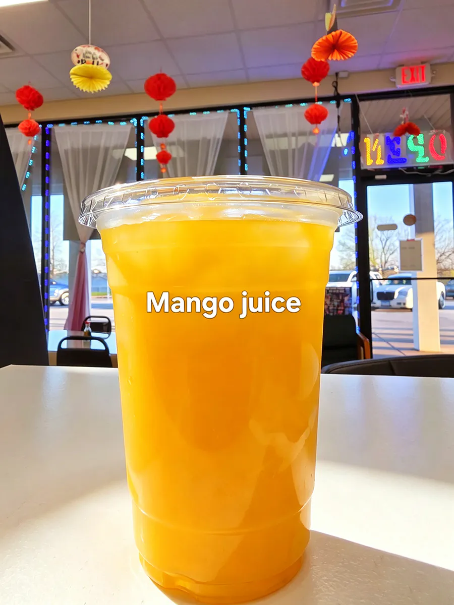 Bright icy fresh cold mango fruit juice at Sushi Way, a Japanese Restaurant in Davenport